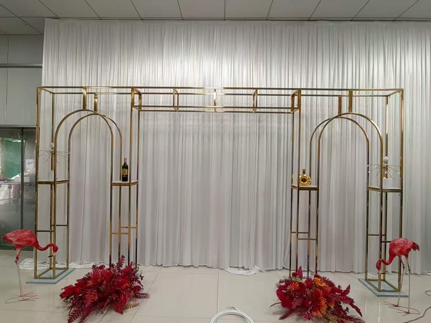 Gold Archway Backdrop with Flamingo Decor