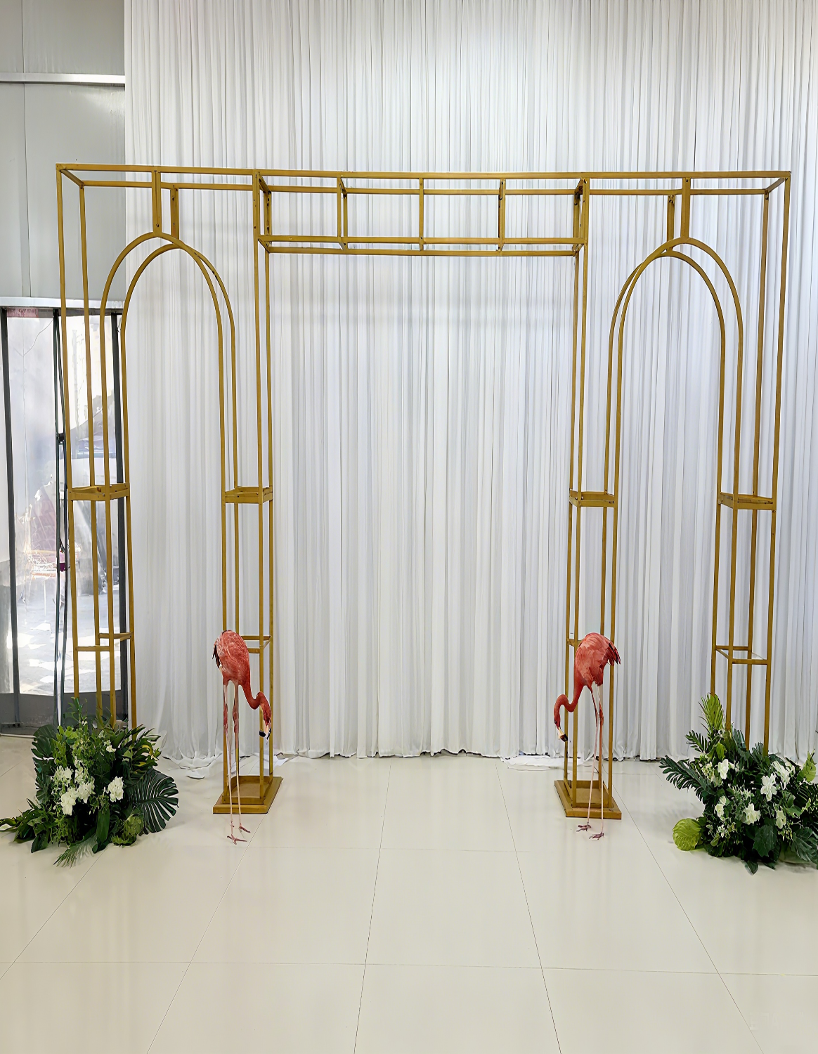 Gold Archway Backdrop with Flamingo Decor