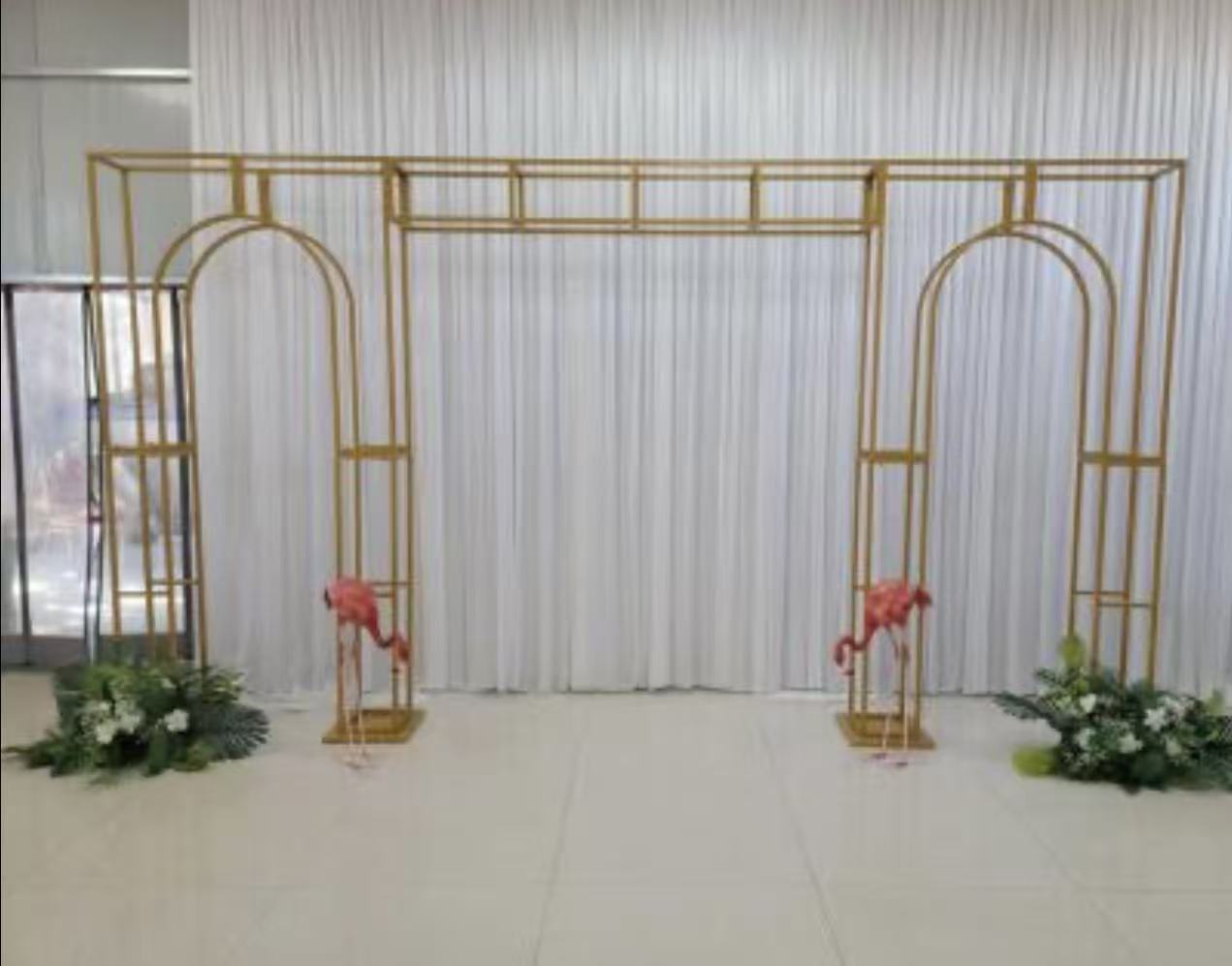 Gold Archway Backdrop with Flamingo Decor